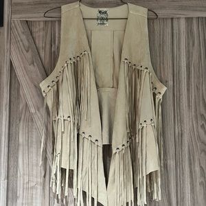 Soft suede fringe vest with studs. Worn once